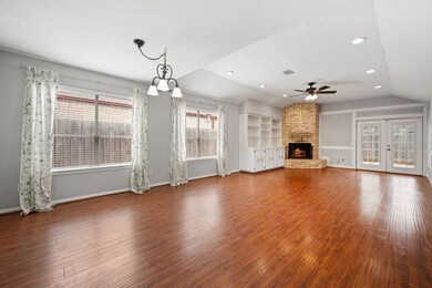 Greatroom with high ceilings and elegant wall moul