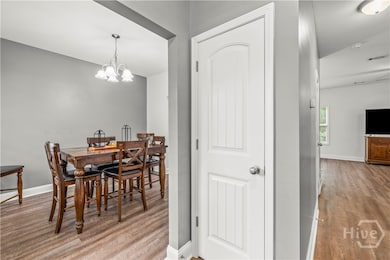 Front entry way. Left is dining, right is office, & straight forward is living room
