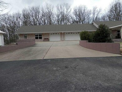 Exterior Front. 2 car garage, plus the apartment w