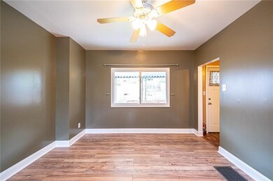 The large dining room space with another large win