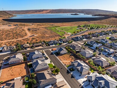 Aerial perspective of suburban area with a large body of water