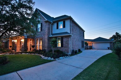 Mature trees, lovely landscaping, a private corner lot and a detached garage compliment the home.