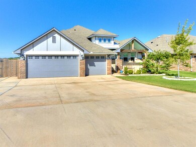 Craftsman house with driveway, brick siding, a garage, a shingled roof, and board and batten siding