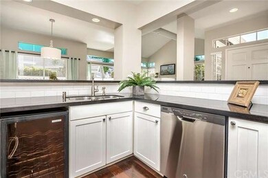 IT COMES WITH A WINE REFRIGERATOR TOO!