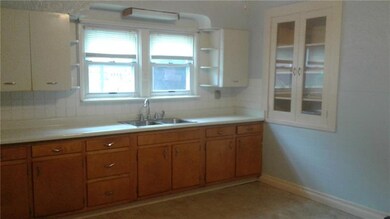 Kitchen windows above sink allow for great sun fil