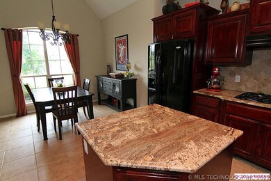 Vaulted ceiling in the kitchen provides an open at