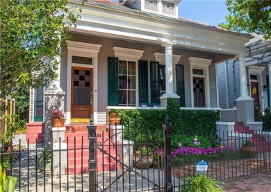 OH SO CHARMING...WROUGHT IRON FENCE, CYPRESS STAIN