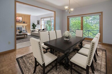Virtually staged dinning room with sliding doors t