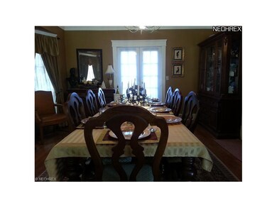 Charming and VERY large Dining room with bay window detail and doors to the outside Deck.  You will be entertaining in this space!