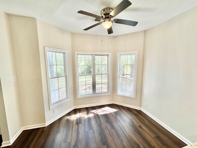 Unfurnished room featuring dark hardwood / wood-st