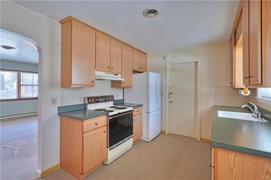 Kitchen was updated with new cabinets and countert