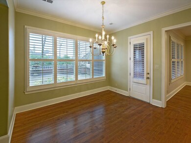 The spacious breakfast room overlooks the outdoor 