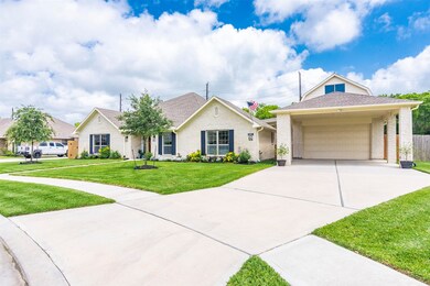 Large detached carport with oversized 4-car garage.