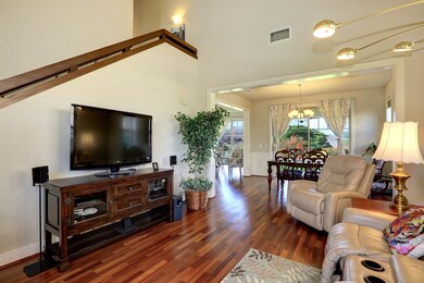 Living Room View to Dedicated Dining Area
