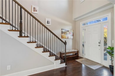 Entryway featuring dark hardwood / wood-style floo