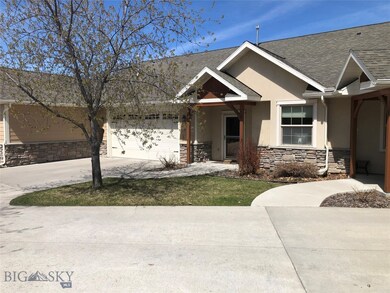 Craftsman-style home featuring a garage