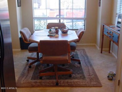 EAT-IN KITCHEN WITH HUGE WINDOWS ON 3 SI