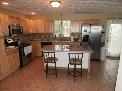 Island kitchen newly renovated tile /granite  feat