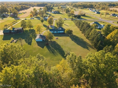 Aerial view of property and surrounding area