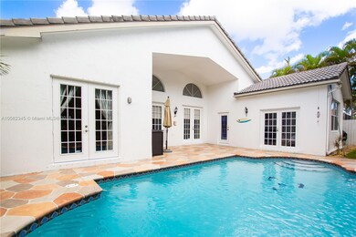family room, master bedroom and jr suite wraps around the space in the yard with a cabana bath access.