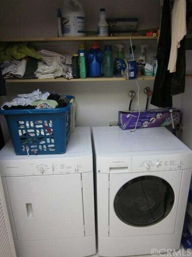 Laundry area inside closet in kitchen