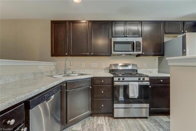 Great kitchen offers stainless steel appliances, built-in microwave & gas range. The abundance of cabinet & counter space provides great storage & organization.