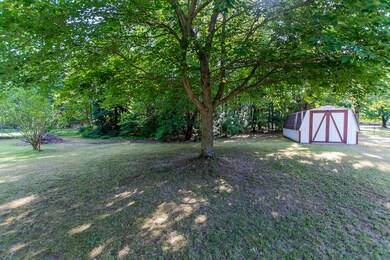 LOTS of yard plus large shed
