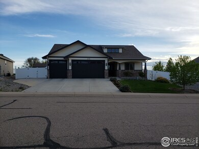 Extended driveway leads to backyard