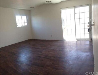 Large bedroom looking out to deck.