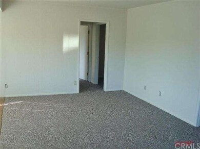 Another view of the living room that leads to the 