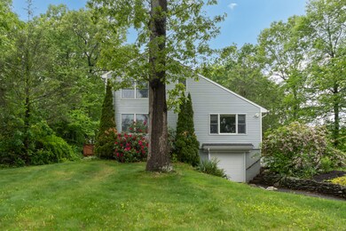 Second driveway with access to garage.
