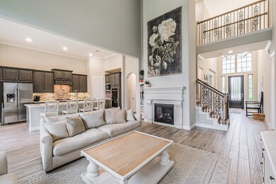 This three year old home in Young Ranch, Katy, is stunning from the moment you step inside. Wood-looking tile throughout the first floor gives a modern, and durable, nod to versatility!