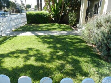 Front Yard with White Picket Fence