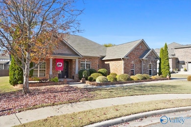 Expansive mature landscaping and grassy yard space with sprinkler system for easy maintenance!