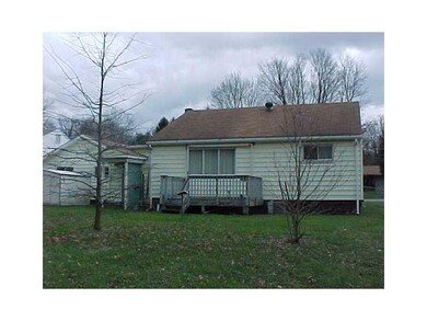Exterior Back. Rear of home home with deck and fen