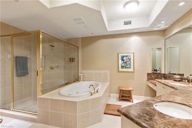 Maser bath with refaced cabinetry and marble count