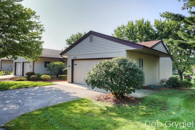 7033 Gardenview Ct SW unit 16, Byron Center, MI 49315 - photo 2