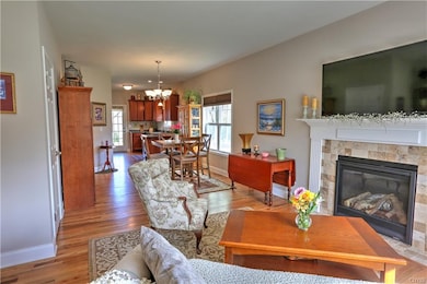 Cozy gas fireplace in the living room will warm yo
