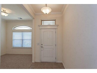 Other. Tiled interior entryway open to the living 