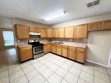 Spacious Kitchen (14 x 11), Newer cabinets and cou