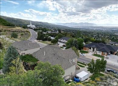 Aerial perspective of suburban area featuring mountains