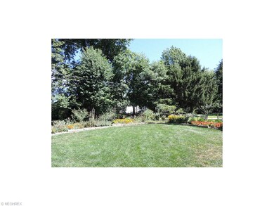 Lovely back yard with perennial gardens and privac