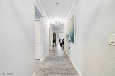 Hall featuring ornamental molding