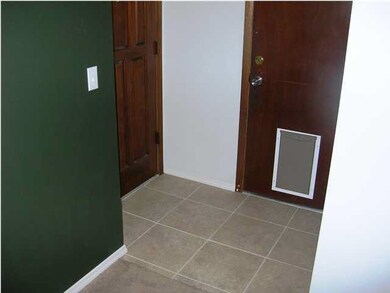 New Tile and Door to Two-Car Garage