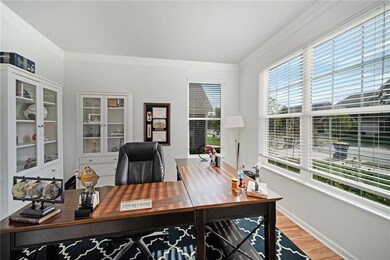 Generous sized office/den/playroom with a great view!