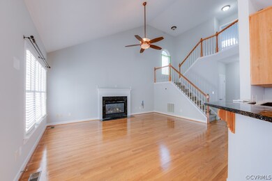 Huge living room with vaulted ceiling, gas firepla