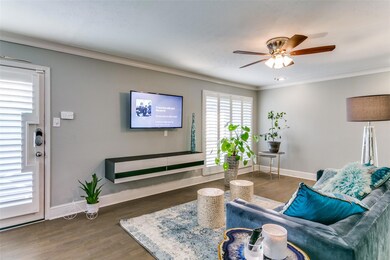 Living room with dark wood flooring, ornamental mo