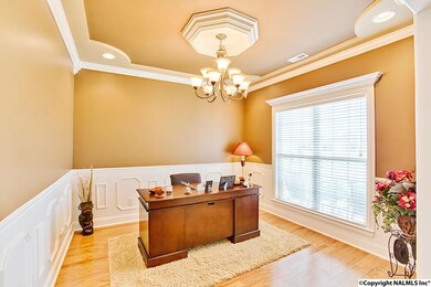 Attention to the details is evident the moment you walk in to this home.  The wainscoting as well as the specialty ceiling and medallion provide the 