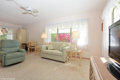06_724SWLakeCt_3_FamilyRoom_HiRes
