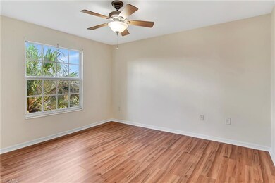 Empty room featuring ceiling fan and light hardwood / wood-style floors